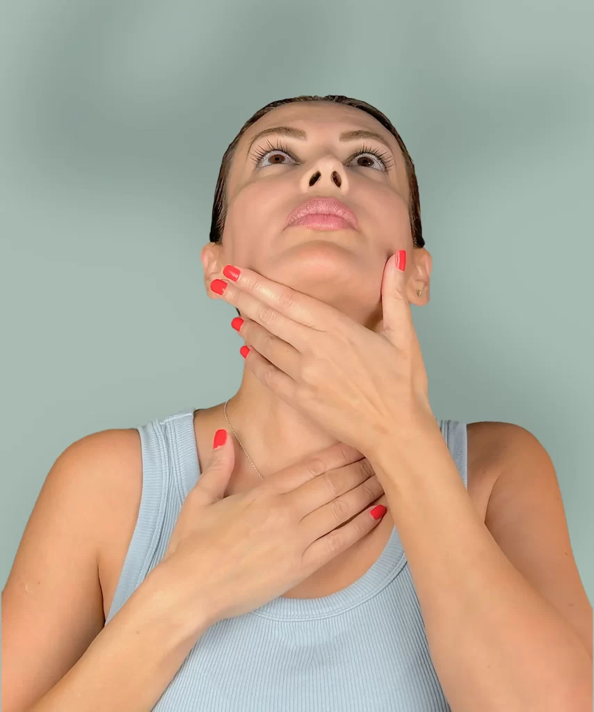 Artemis , certified face yoga coach, demonstrating natural exercises for wrinkle reduction and skin toning